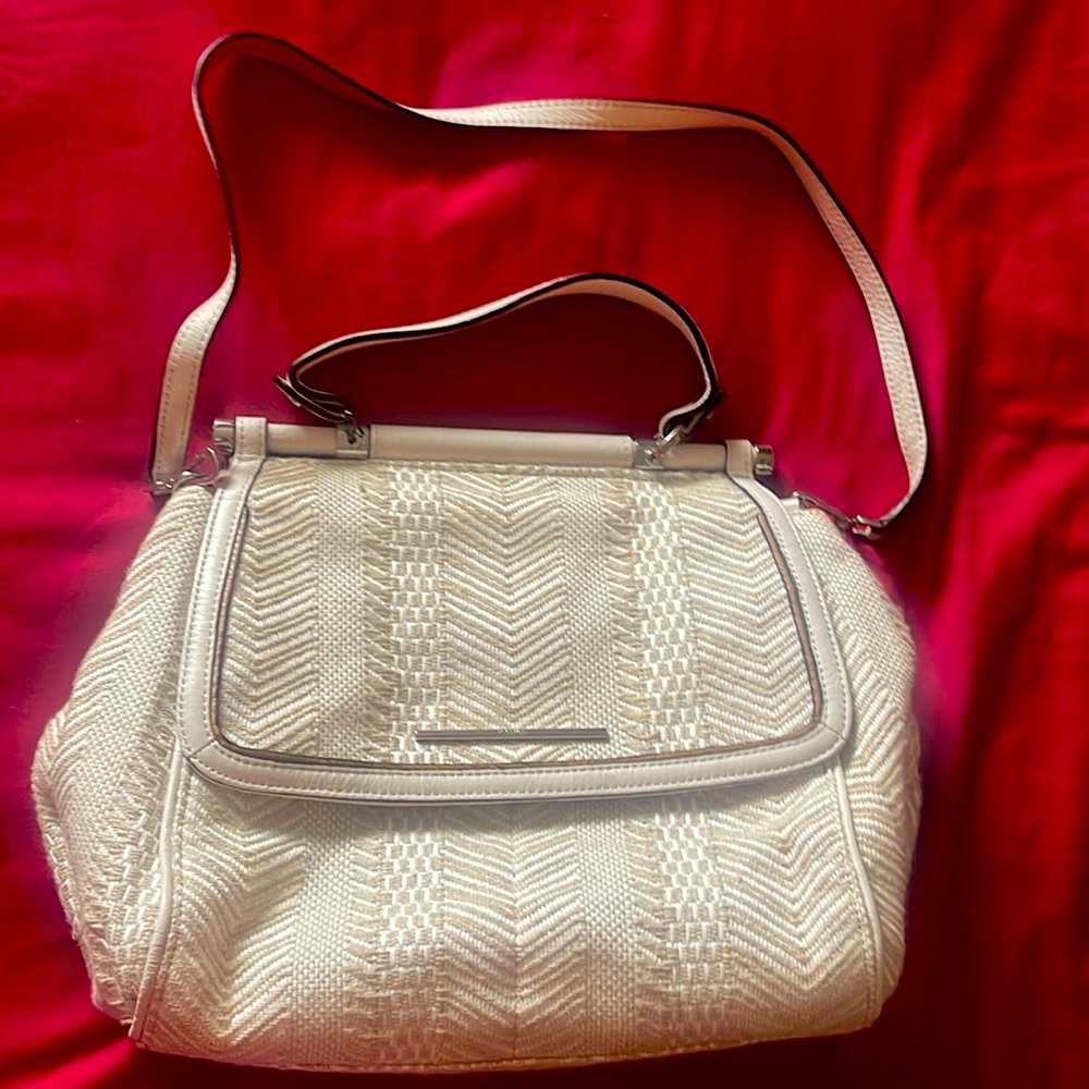 Almost a new bag, Calvin Klein Brend. in good condition, beige color.